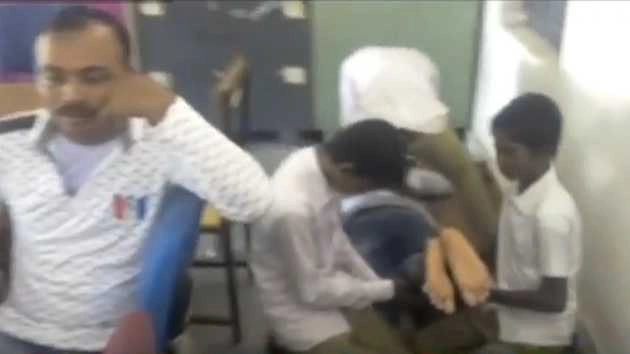 Mid-day massage instead of mid-day meal; School teacher caught on camera