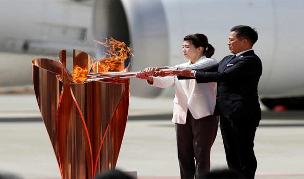 Olympic flame display ends after Japanese PM declares state of emergency