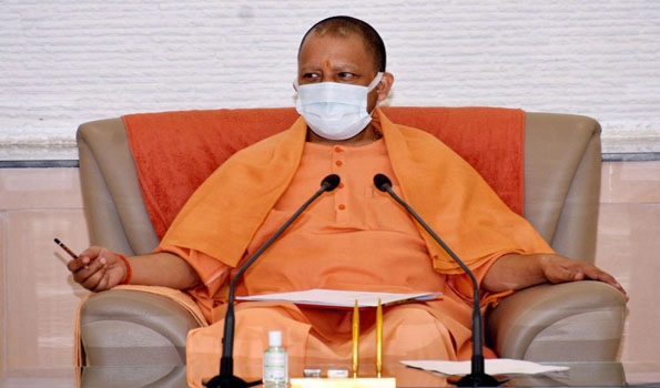 CM Yogi releases IIT Kanpur’s study on UP govt's handling of COVID which speaks about apt dealing