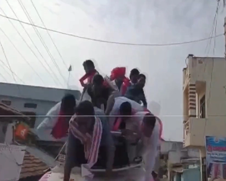 VIDEO: Telangana minister KTR Rao falls down from vehicle during poll rally