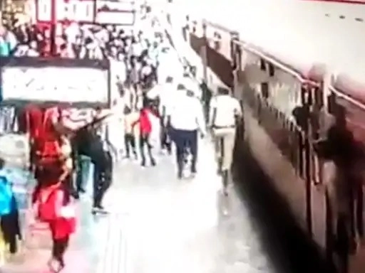 Passenger's foot slips while boarding moving train