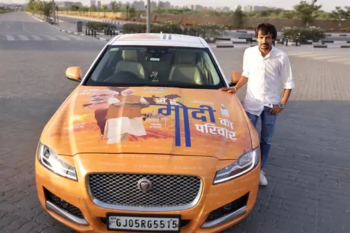 Surat businessman showcases Modi government's achievements on 1 crore Jaguar car