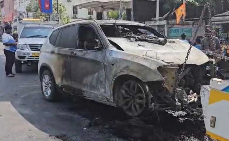 A BMW car worth 70 lakhs caught fire near a petrol pump in Ahmedabad
