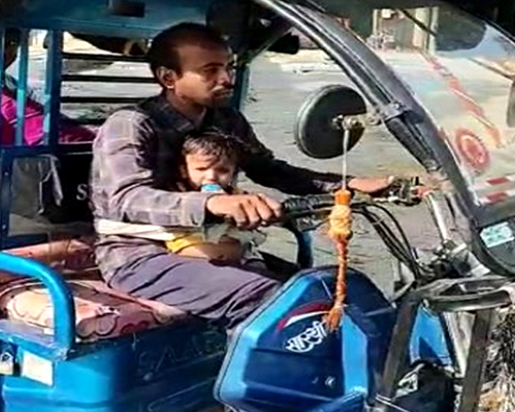 सवा साल की बेटी को सीने से लपेटकर चला रहा था ई-रिक्शा, सोशल मीडिया पर वीडियो वायरल - Ballia E- rikshaw Viral News