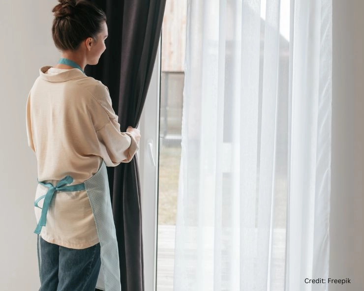 how to clean curtains while hanging