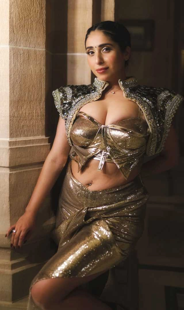 singer neha bhasin looking hot in golden shimmery slit dress - singer neha bhasin looking hot in golden shimmery slit dress