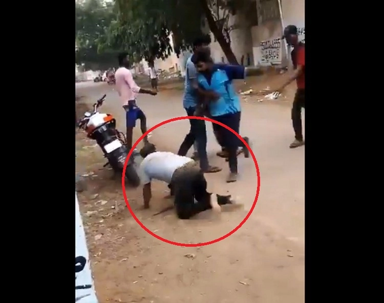 man beaten by youth