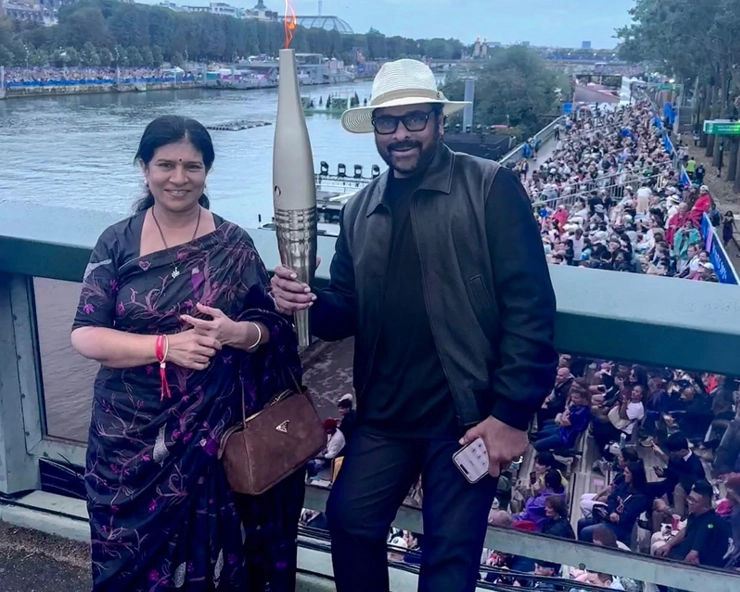 Chiranjeevi and Surekha with the Olympic torch