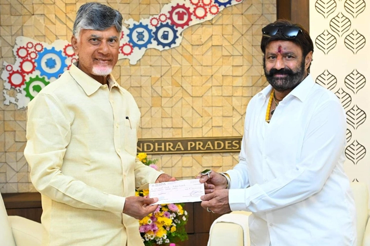 Balakrishna gave a check  to Chandrababu