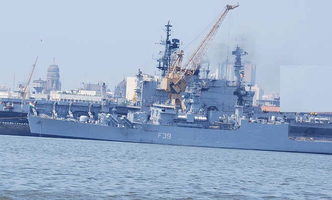 Navy missile frigate tips over; 14 injured, 2 sailors missing