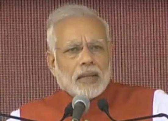 A day after Rahul's corruption charge, Modi mocks at Congress leader