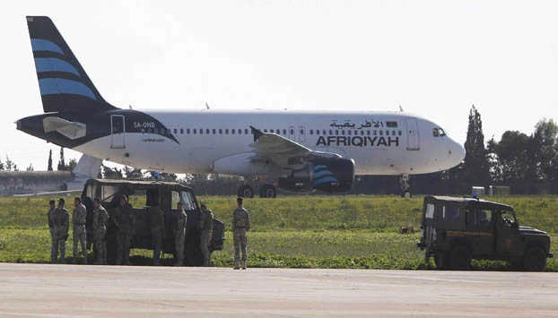 Hijacked Libyan plane lands in Malta with 118 on board