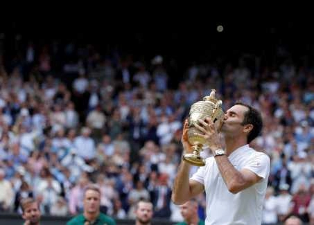 Federer wins record eighth Wimbledon title as Cilic crumbles