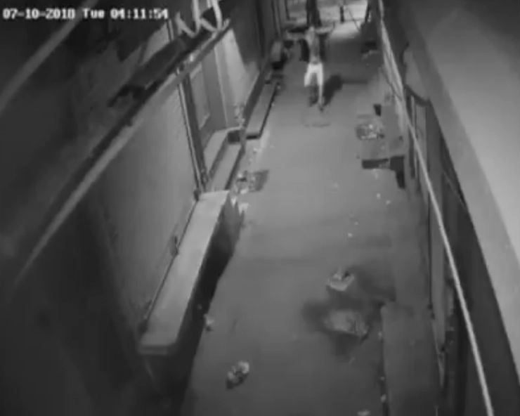 Watch: Thief shakes a leg before attempting to break into a shop