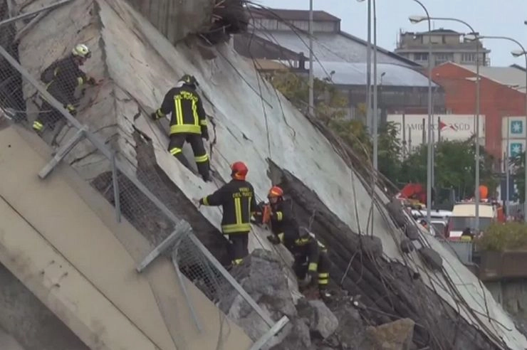 Italy motorway bridge collapses in heavy rains, killing at least 35