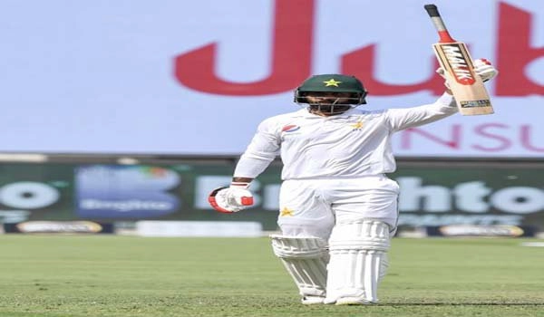 Mohammad Hafeez's century puts Pakistan on top