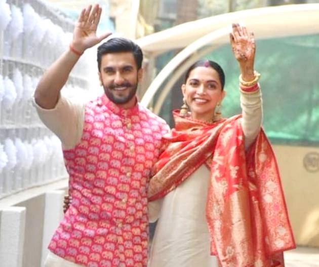 Newlyweds Deepika and Ranveer arrive in Mumbai. See pics