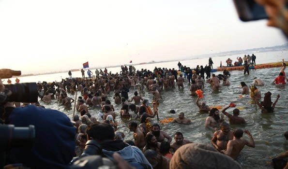 Kumbh starts with thousands taking holy dip in shivering waters of Sangam
