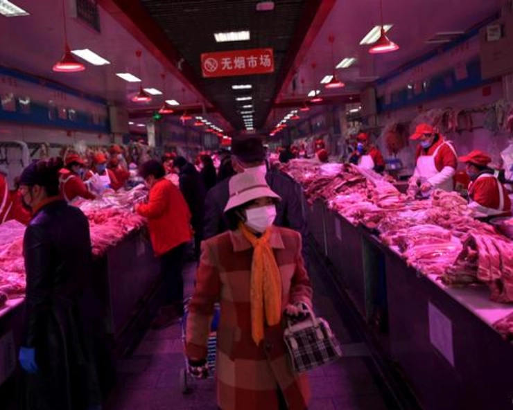 WHO team visits Wuhan wet market to find COVID clues