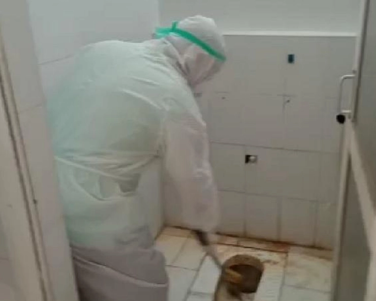Watch: Pondy Health Minister cleans toilet in COVID-19 ward after patients complaints