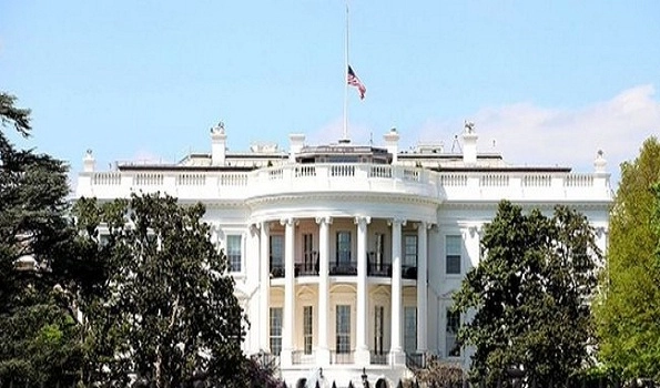 US flag lowered at White House as COVID-19 death toll exceeds 500,000