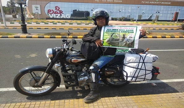Biker who travels across India to save one-horned rhinos