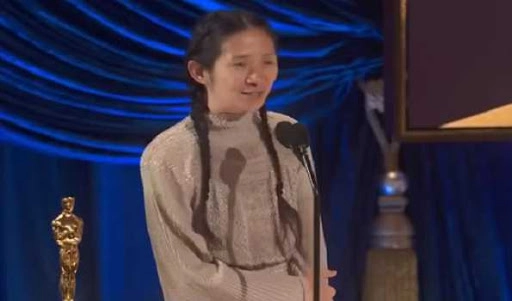 Nomadland’s Chloe Zhao becomes first woman of color to win Oscar for Direction