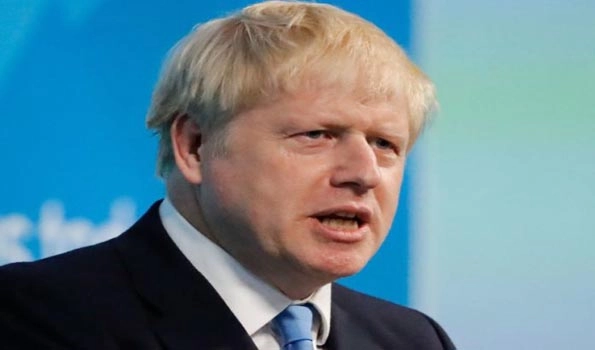 UK PM Boris Johnson confirms one Omicron death, urges people to get booster doses