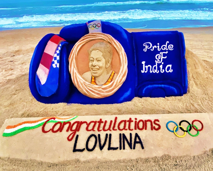 Sand artist Sudarshan creates 10ft long boxing gloves on sand to wish Lovlina