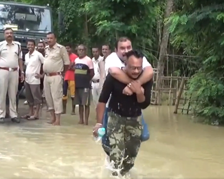 WATCH - Assam MLA facing ire for piggyback ride to inspect flood situation