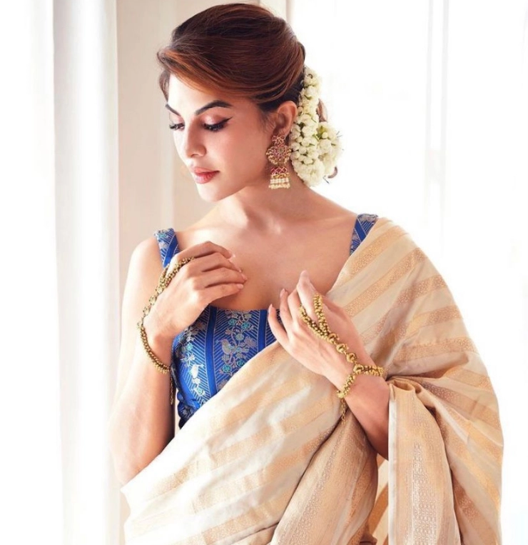 Jacqueline Fernandez looks absolutely gorgeous in a saree, and asks fans if they listened 'RaRaRakkamma'
