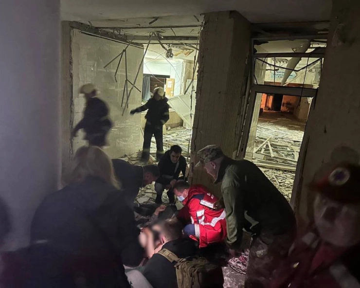 rescuers and medics work in a clinic hit by Russian air strike