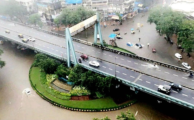 Photo Heavy Rain In Mumbai: મુંબઈમાં ભારે વરસાદથી લોકો થયા પરેશાન,જુઓ ફોટા