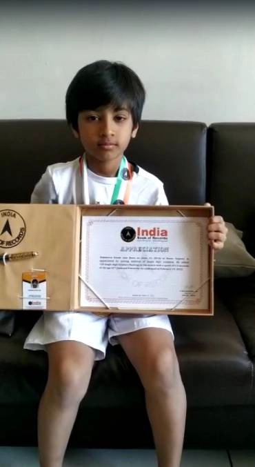 સુરતના 7 વર્ષના બાળકે 0.5 સેકન્ડની ઝડપે 150 અંકનો સરવાળો કરી દેતા ઈન્ડિયા બૂક ઓફ રેકોર્ડમાં સ્થાન મળવ્યું