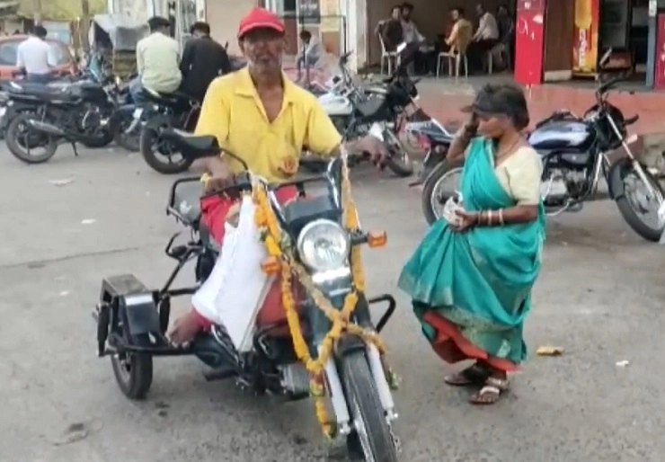 A beggar, Santosh Kumar Sahu buys a moped motorcycle
