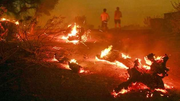 कैलिफोर्निया के जंगलों में आग, 10 मरे - California firestorm, 10 dead