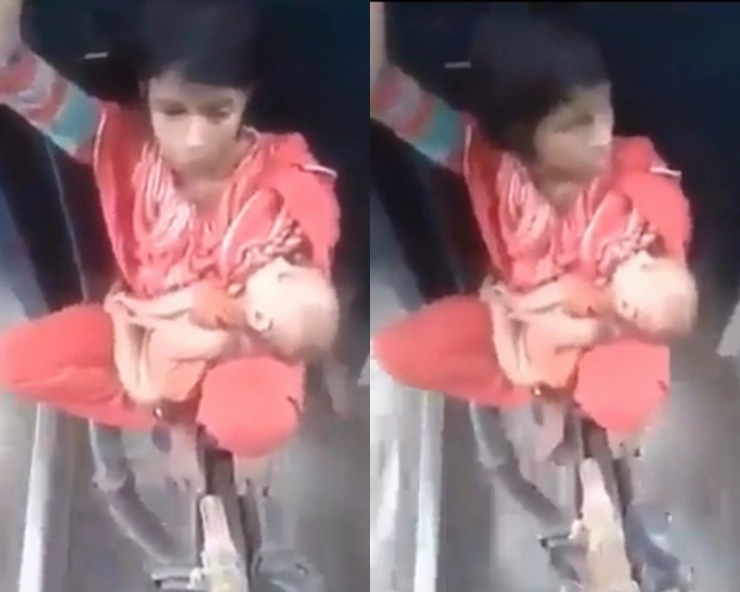 जानें, दो बोगी के बीच बच्चे को गोद में लेकर सफर करती मां के वीडियो का सच क्या है - video of a woman with an infant travelling between train bogies viral, fact check