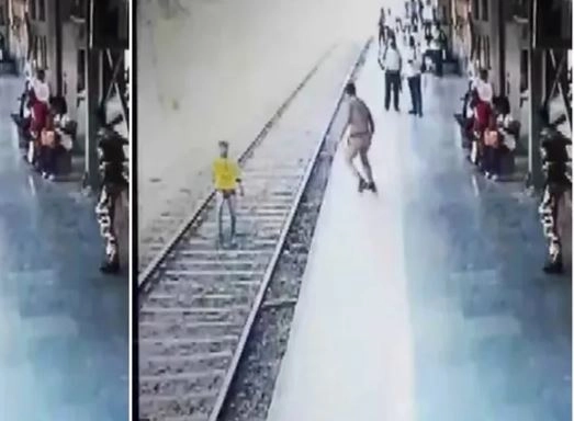 सुसाइड के लिए कूद गया पटरी पर, पुलिसकर्मी ने जो किया उसके लिए लोग उसे कर रहे सैल्‍यूट, देखें वीडियो - jumped on the track to commit suicide