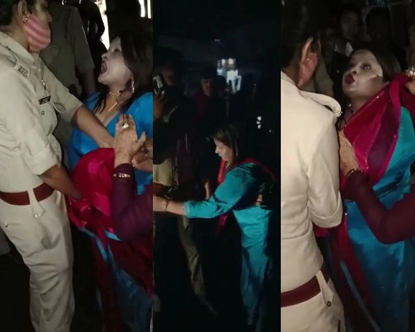 मेरठ की सड़क पर महिला ने किया हाईवोल्टेज ड्रामा, पुलिसकर्मियों पर फेंकी चप्पल - Woman did high voltage drama on the road of Meerut