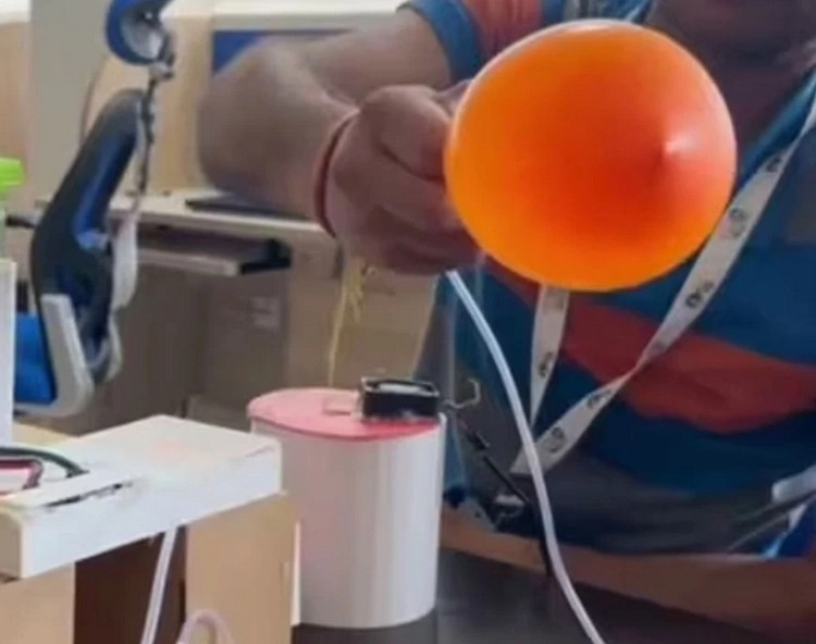 blowing air in a balloon