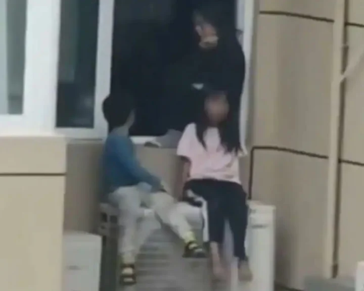 SHOCKING! Mother makes children sit on 23rd-floor AC unit during argument with husband