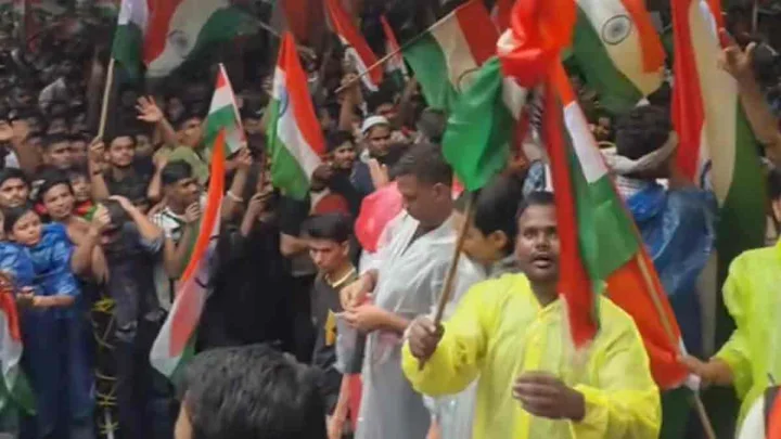 'Cockroaches' take on Modi with parliament march