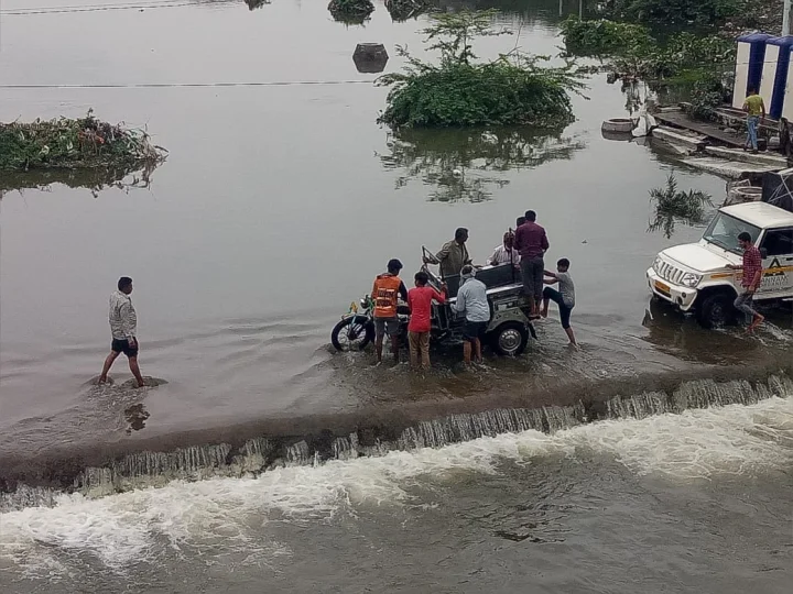 Young Man Riding A Bike On A Bridge In Rajkot