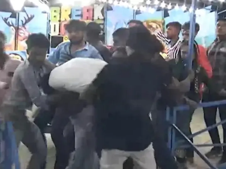 A young man who was sitting in a ride