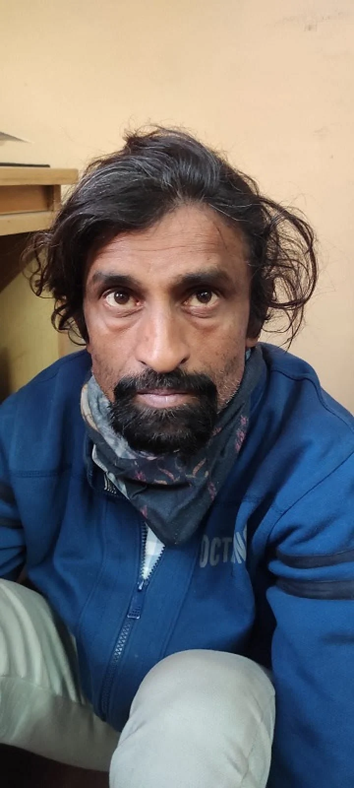 two caught carrying a two-month-old newborn baby