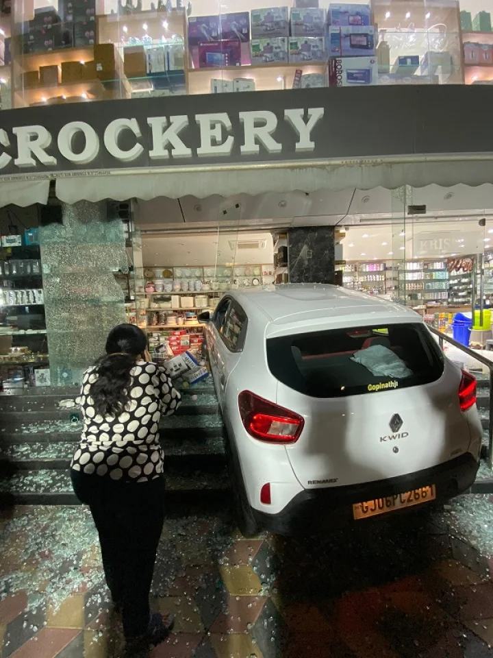 In Vadodara, woman presses accelerator instead of brake, car bounces, jumps 5 steps...breaks glass and enters showroom