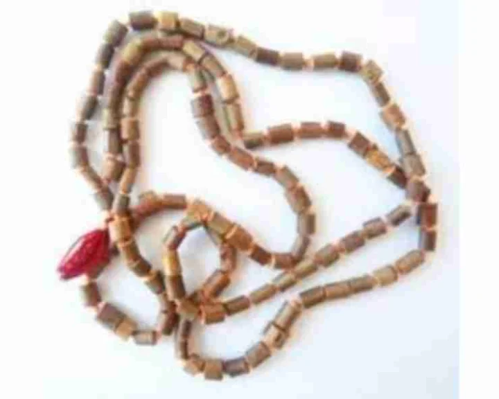chanting with sandalwood garland