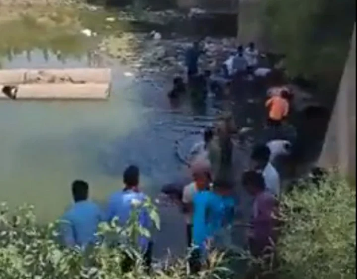 Currency note bundles floating in a canal in a Bihar town