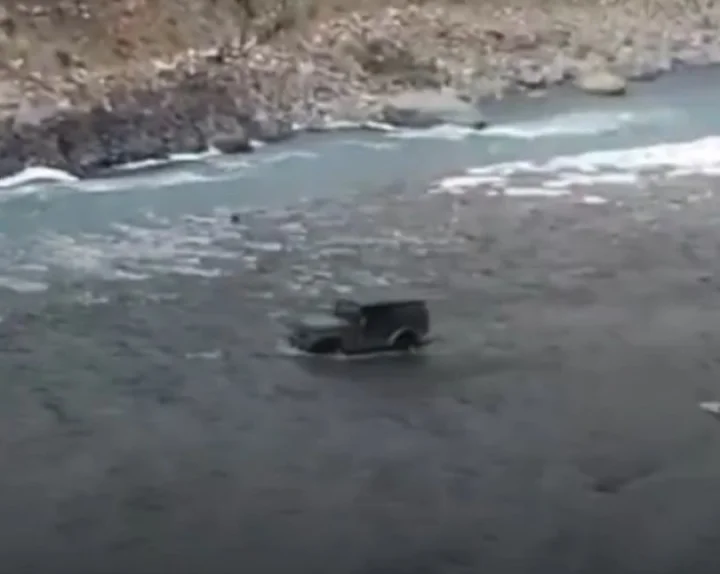 mahindra thar in river