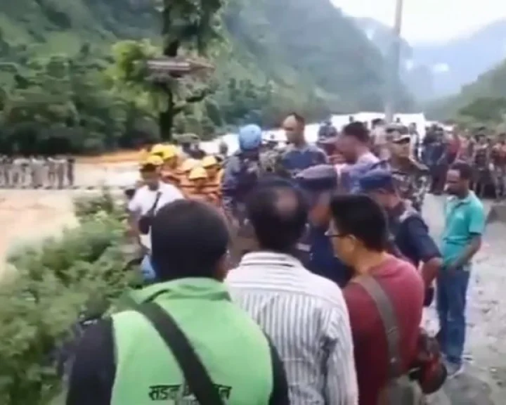 2 buses swept away in river in Nepal
